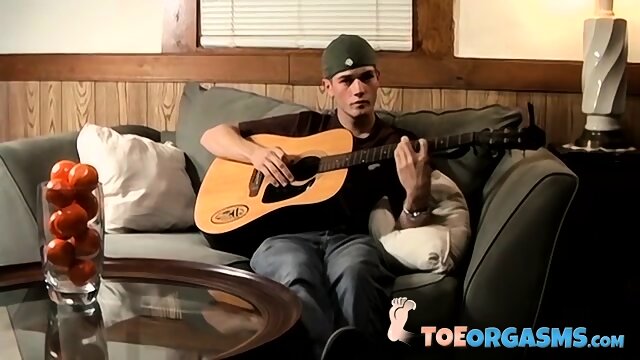 Big cocked stud wanks off his big long dick and cums