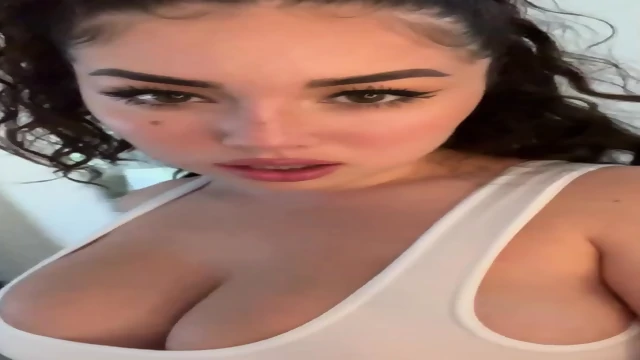 With Large Boobs Masturbates