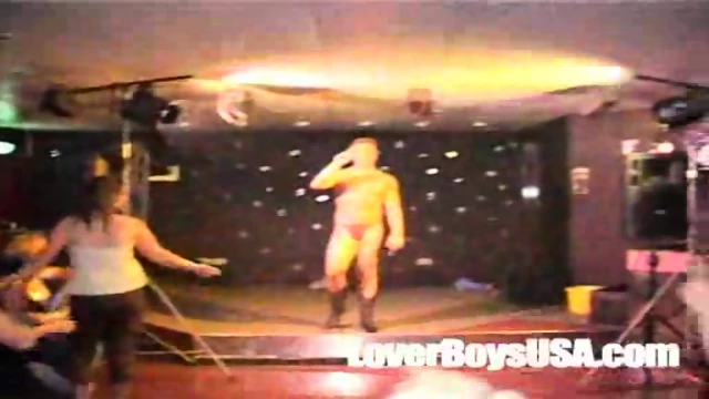 Amateur Girl sucks naked stripper in public party